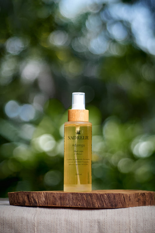 Huile ADJONGO – Soin Ancestral Bébé, Corps & Cheveux